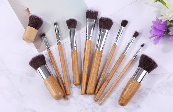 11 bamboo handles, makeup brush, tool set, linen bag, blush brush, foundation brush, and a full set of makeup.