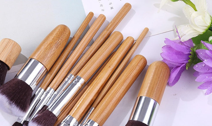 11 bamboo handles, makeup brush, tool set, linen bag, blush brush, foundation brush, and a full set of makeup.