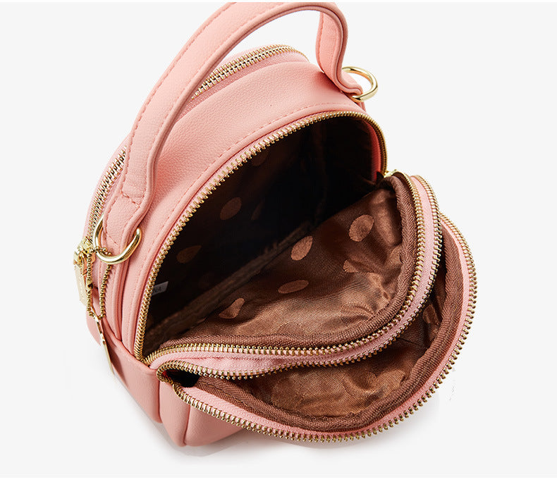 Three-layer pouch with zippered shoulder belt