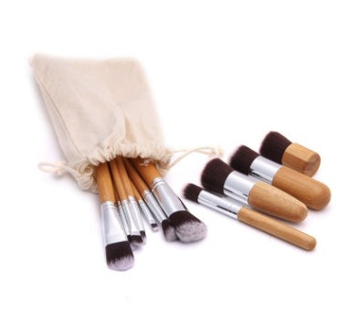 11 bamboo handles, makeup brush, tool set, linen bag, blush brush, foundation brush, and a full set of makeup.