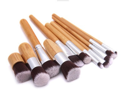 11 bamboo handles, makeup brush, tool set, linen bag, blush brush, foundation brush, and a full set of makeup.