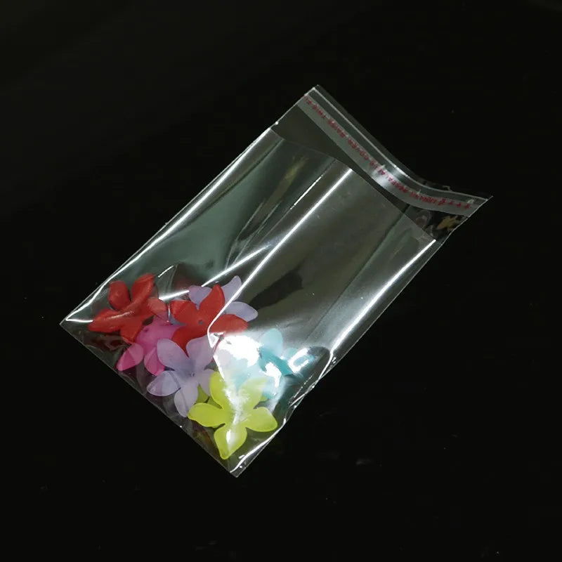 100pcs transparent OPP self-adhesive glass paper bag, self sealing packaging bag for candy, biscuits, toys and party gifts